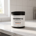 Consistency elektrolyter blodapelsin, svart burk på köksbänk