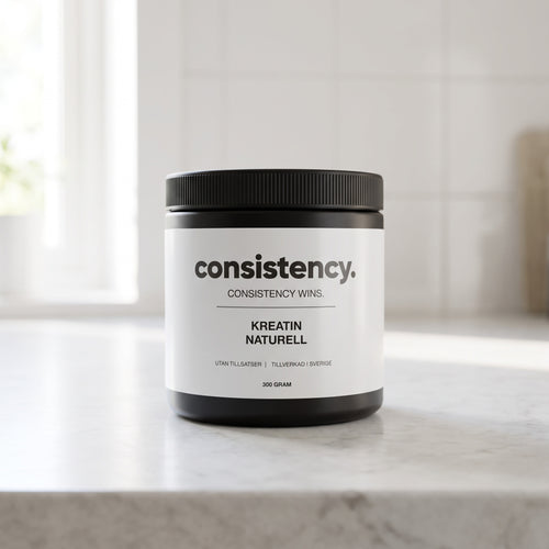 Consistency kreatin naturell, svart burk på köksbänk